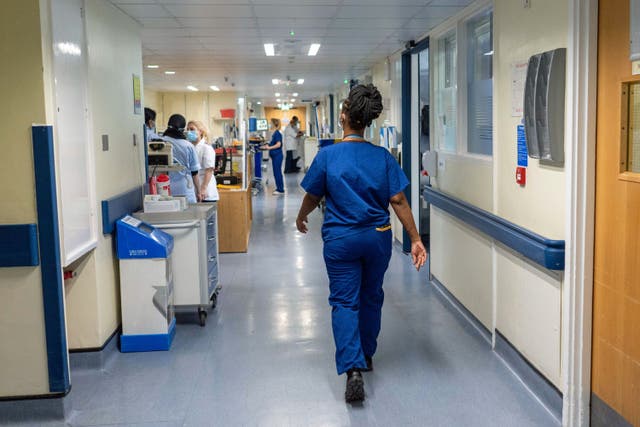 <p>Nurse in an NHS hospital  </p>